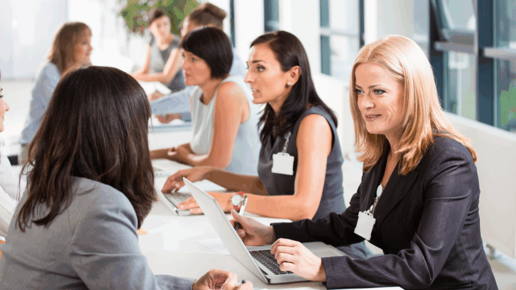 HR professionals using job fair charter bus transportation to arrive at a recruitment event in Massachusetts