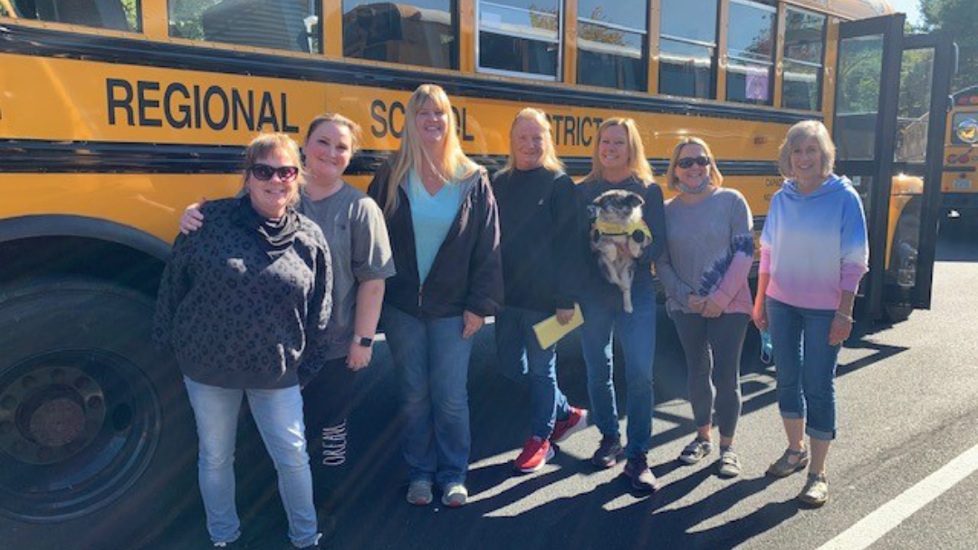 University move-in shuttle buses in Massachusetts helping students and families with campus arrivals