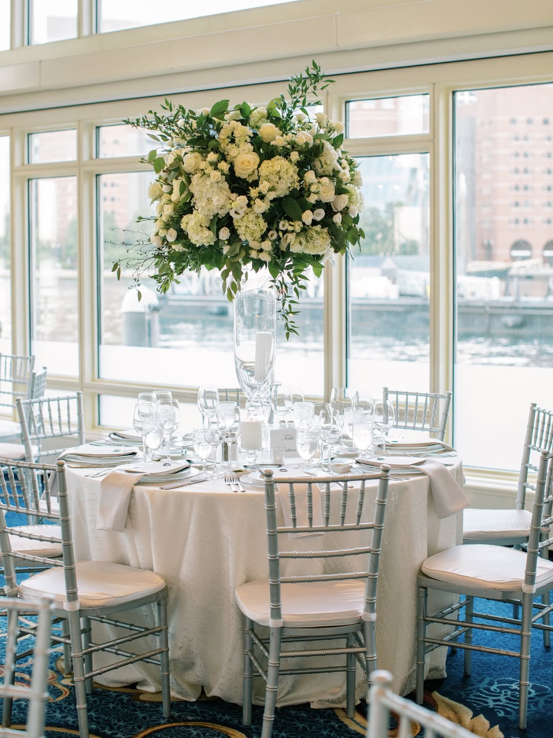 Boston Harbor Hotel winter wedding venue at Rowes Wharf with lit archway and icy waterfront views
